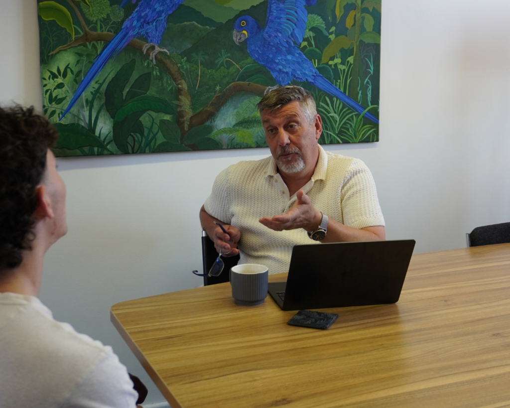 Managing Director Dave Davis in a meeting with a client