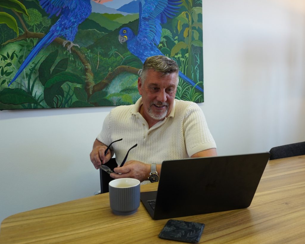 Managing Director Dave Davis on an online meeting with a client